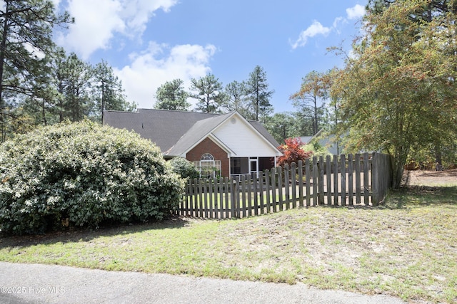 995 Monticello Dr, Pinehurst, NC 28374 - view of home's exterior with brick siding