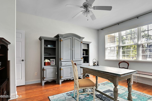 161 N Lake Dr, Boiling Spring Lakes, NC 28461 - office with baseboards, ceiling fan, and wood finished floors