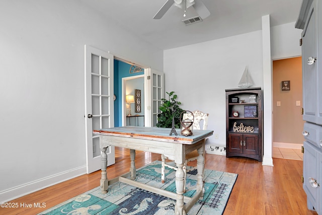 161 N Lake Dr, Boiling Spring Lakes, NC 28461 - office space with visible vents, a ceiling fan, light wood finished floors, and baseboards