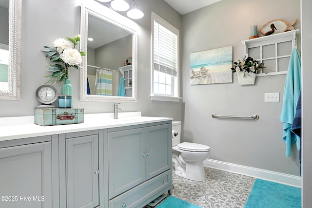 161 N Lake Dr, Boiling Spring Lakes, NC 28461 - full bath featuring toilet, tile patterned floors, curtained shower, and vanity