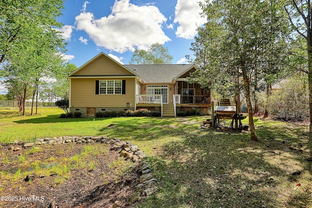 161 N Lake Dr, Boiling Spring Lakes, NC 28461 - rear view of house with a lawn, crawl space, and a deck