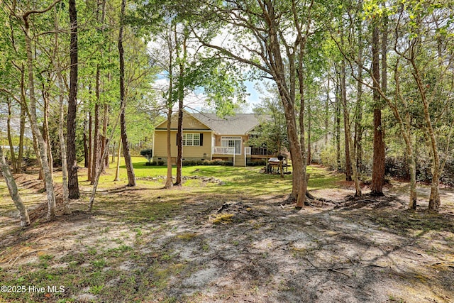 161 N Lake Dr, Boiling Spring Lakes, NC 28461 - view of yard featuring a wooden deck