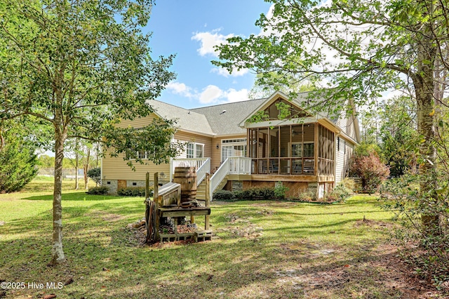 161 N Lake Dr, Boiling Spring Lakes, NC 28461 - rear view of house with a lawn, stairs, a sunroom, and a deck