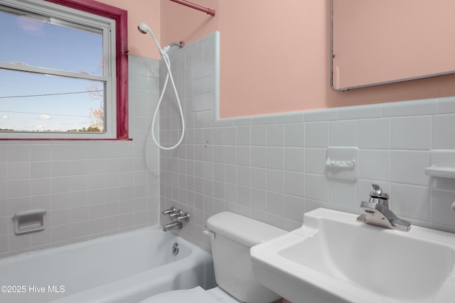 921 Greenfield Heights Blvd, Havelock, NC 28532 - bathroom with toilet, shower / tub combination, a sink, and tile walls