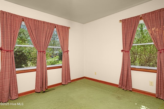 921 Greenfield Heights Blvd, Havelock, NC 28532 - spare room featuring healthy amount of natural light, carpet floors, and baseboards