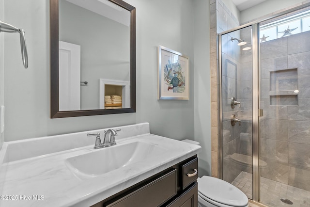 8549 Oak Abbey Trl NE, Leland, NC 28451 - bathroom with toilet, vanity, and a stall shower