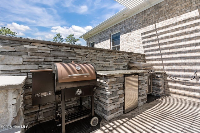 8549 Oak Abbey Trl NE, Leland, NC 28451 - exterior space with an outdoor kitchen