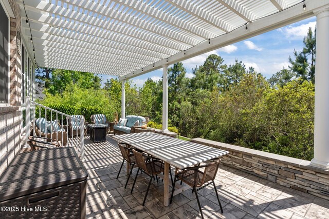 8549 Oak Abbey Trl NE, Leland, NC 28451 - view of patio / terrace featuring a pergola, outdoor lounge area, and outdoor dining space