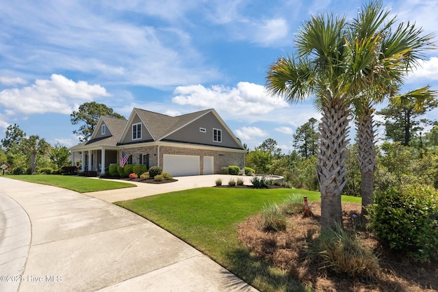 8549 Oak Abbey Trl NE, Leland, NC 28451 - craftsman-style home with stone siding, a front lawn, and concrete driveway