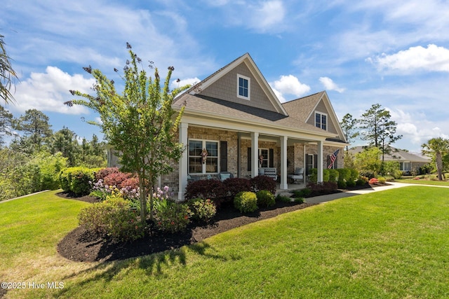 8549 Oak Abbey Trl NE, Leland, NC 28451 - view of property exterior featuring a yard and covered porch
