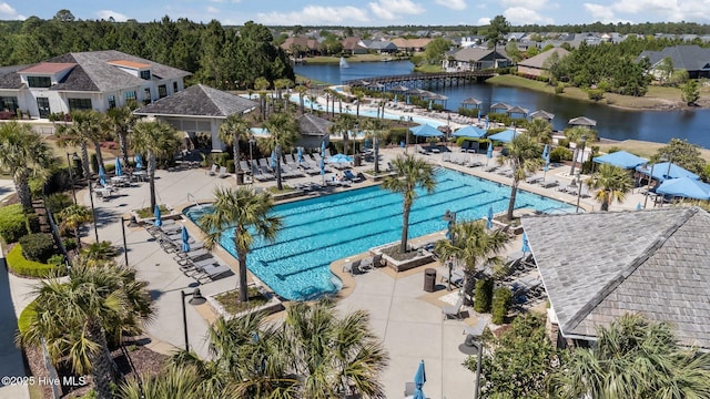 8549 Oak Abbey Trl NE, Leland, NC 28451 - community pool featuring a water view and a residential view