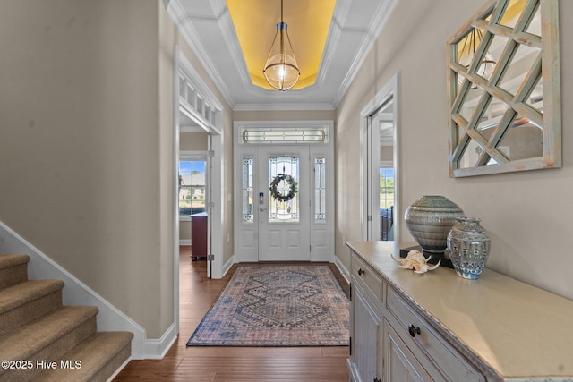 8549 Oak Abbey Trl NE, Leland, NC 28451 - foyer entrance featuring wood finished floors, stairs, baseboards, and ornamental molding