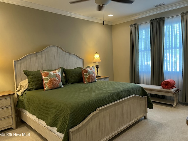 bedroom featuring ceiling fan, visible vents, crown molding, carpet, and recessed lighting