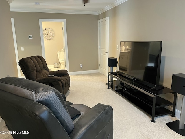 carpeted living room with baseboards and ornamental molding