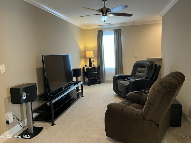 living room featuring crown molding, baseboards, ceiling fan, and carpet