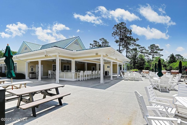 exterior space with outdoor dining space and a patio