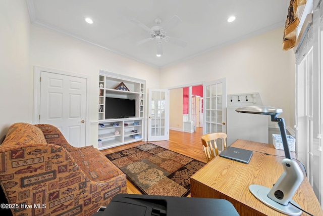 office area with ornamental molding, ceiling fan, and wood finished floors