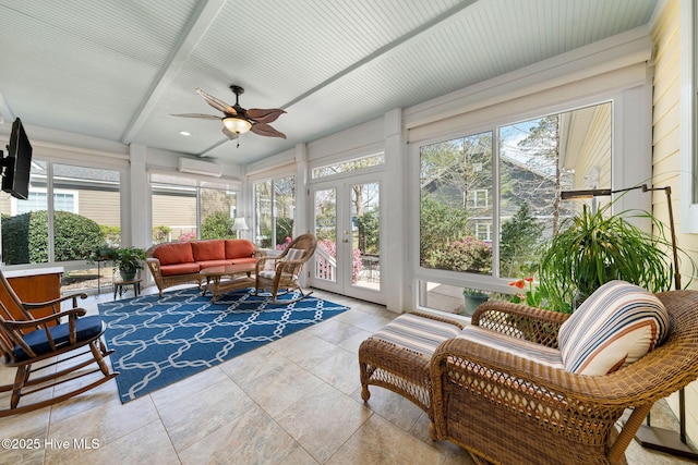 sunroom featuring french doors, tile patterned floors, and a wall mounted AC