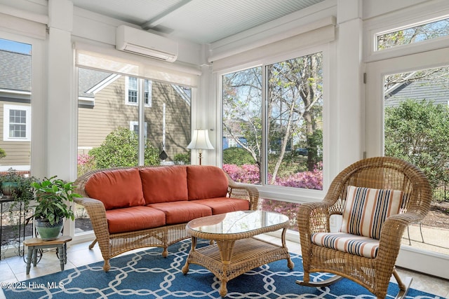 sunroom / solarium featuring tile patterned floors and a wall mounted AC