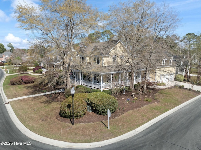 view of front of house featuring a garage and covered porch