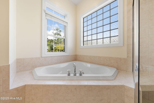 bathroom featuring a garden tub