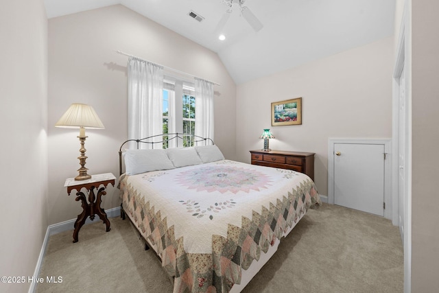 bedroom featuring baseboards, vaulted ceiling, a ceiling fan, visible vents, and light colored carpet