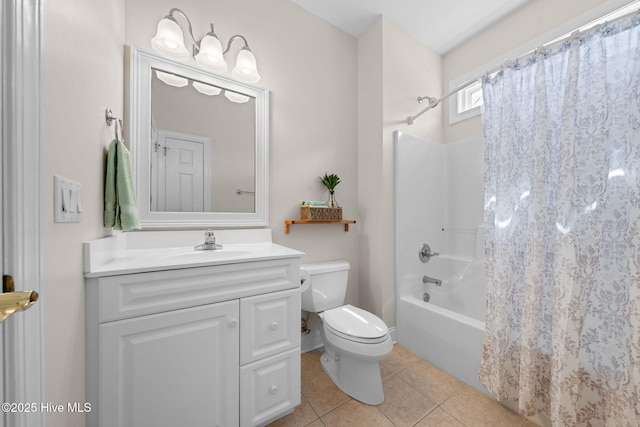 full bath with toilet, tile patterned floors, shower / tub combo with curtain, and vanity