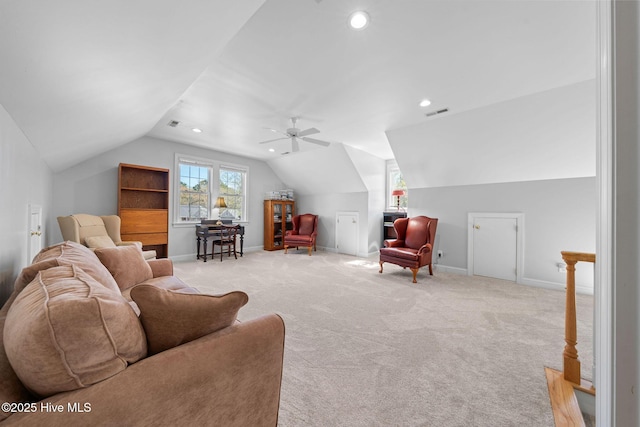 living area with light colored carpet, baseboards, lofted ceiling, and recessed lighting
