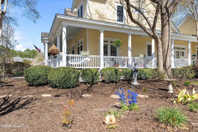 view of front of property featuring covered porch
