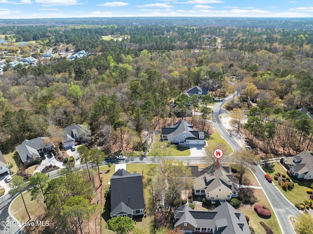 bird's eye view with a view of trees and a residential view