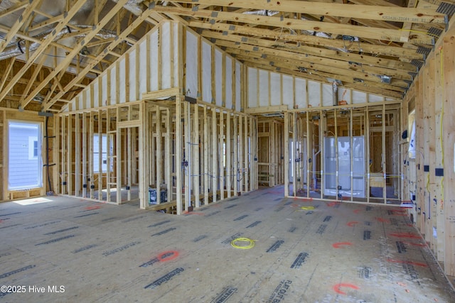 misc room with high vaulted ceiling