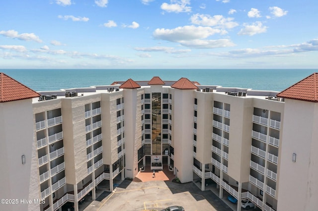2000 New River Inlet Rd Unit 3513, North Topsail Beach, NC 28460 - view of building exterior featuring a water view