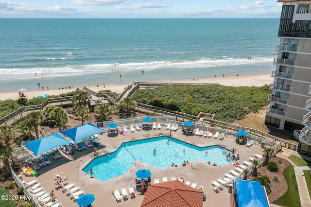 2000 New River Inlet Rd Unit 3513, North Topsail Beach, NC 28460 - community pool featuring a view of the beach, a patio, fence, and a water view
