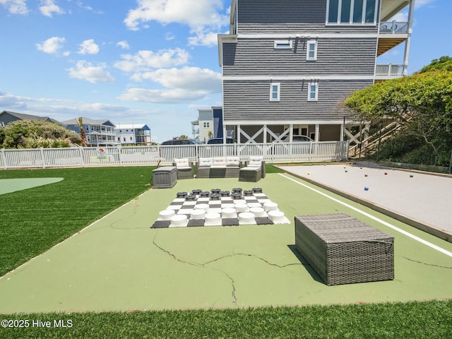 2000 New River Inlet Rd Unit 3513, North Topsail Beach, NC 28460 - exterior space featuring a patio, fence, and an outdoor hangout area