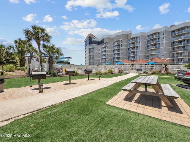 2000 New River Inlet Rd Unit 3513, North Topsail Beach, NC 28460 - view of community with fence and a lawn