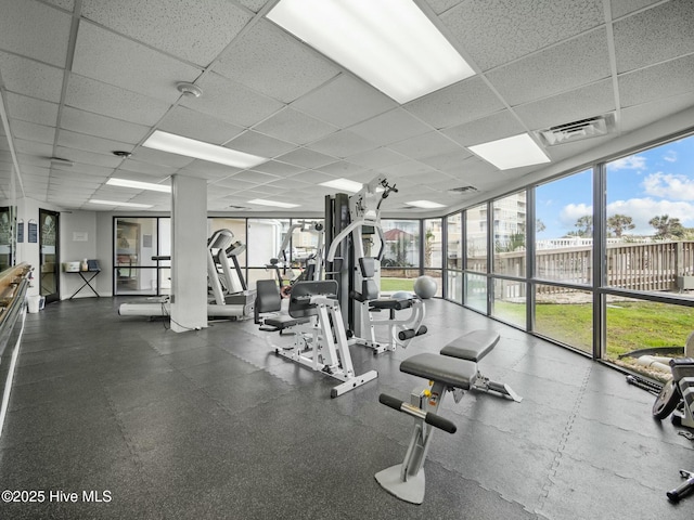 2000 New River Inlet Rd Unit 3513, North Topsail Beach, NC 28460 - workout area featuring a drop ceiling, visible vents, and expansive windows