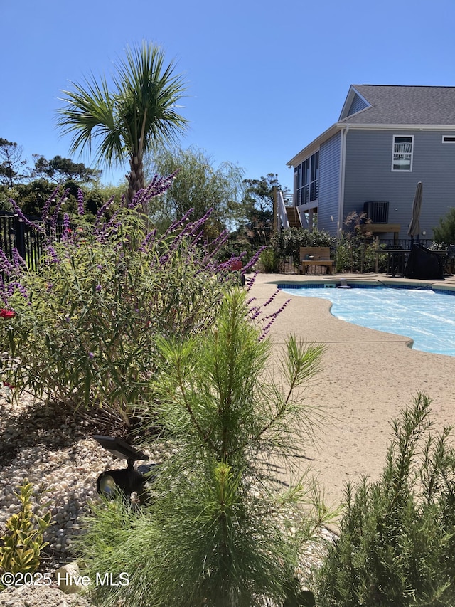 view of pool featuring a fenced in pool and a patio area