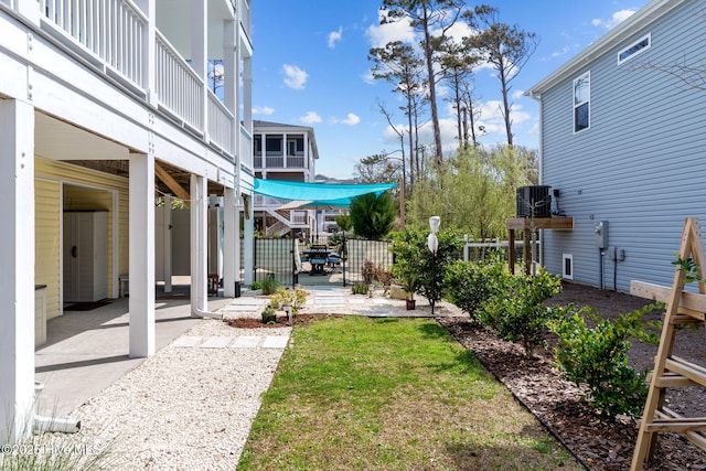 view of yard featuring a patio and fence