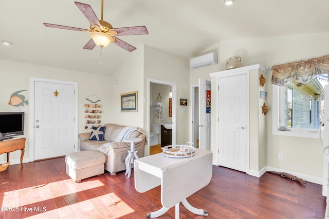 living area with a wall unit AC, a ceiling fan, vaulted ceiling, baseboards, and dark wood-style floors