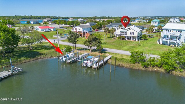 aerial view featuring a residential view and a water view
