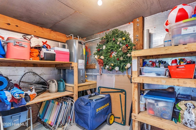 storage area featuring electric water heater