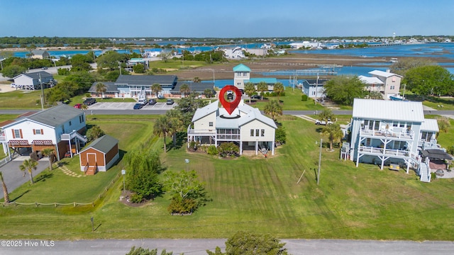 aerial view featuring a water view