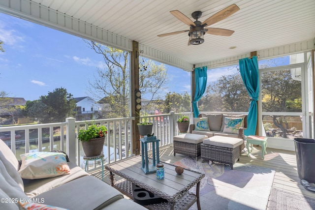 107 SW 25th St, Oak Island, NC 28465 - exterior space featuring ceiling fan and an outdoor living space
