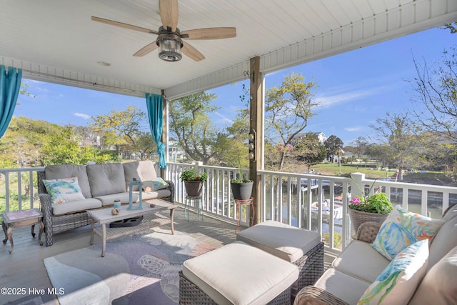 107 SW 25th St, Oak Island, NC 28465 - view of patio / terrace with ceiling fan and an outdoor hangout area
