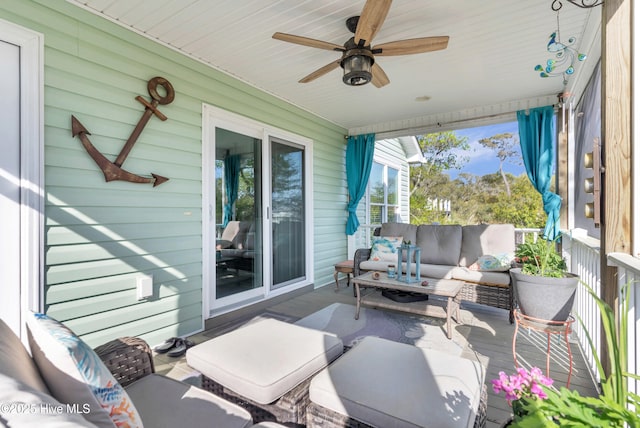 107 SW 25th St, Oak Island, NC 28465 - view of patio / terrace with ceiling fan and an outdoor hangout area