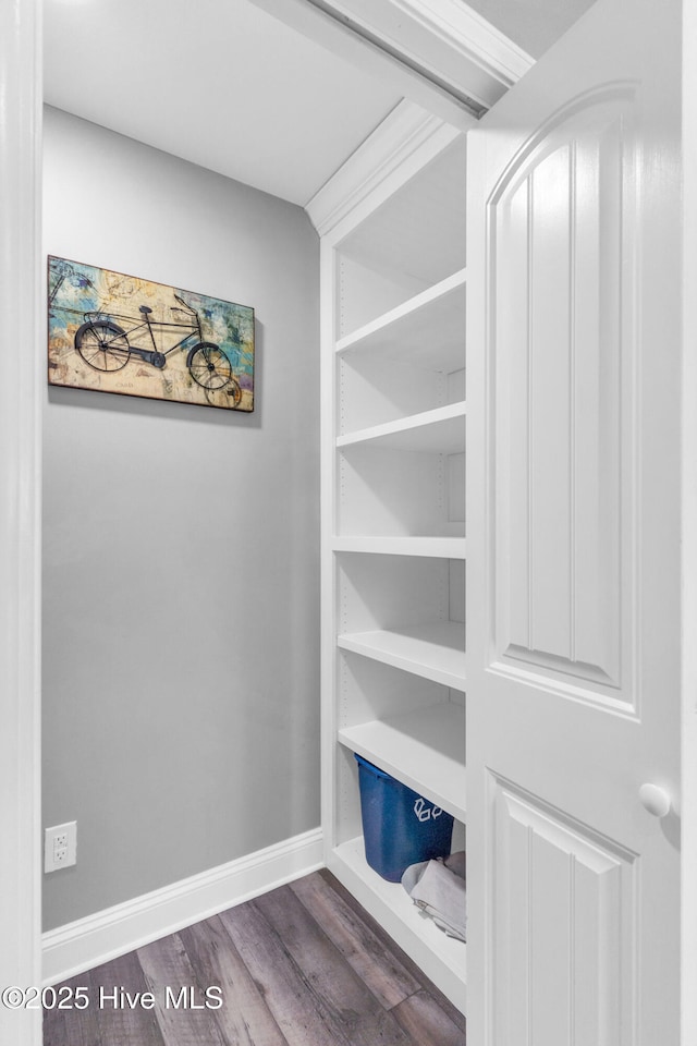 107 SW 25th St, Oak Island, NC 28465 - interior space with wood finished floors and baseboards