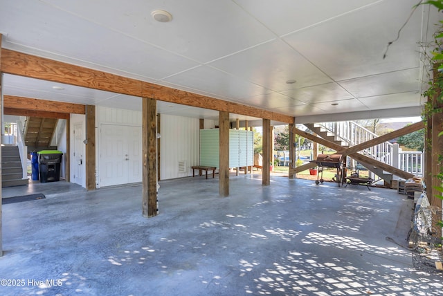 107 SW 25th St, Oak Island, NC 28465 - view of patio / terrace featuring stairs, visible vents, and mail area