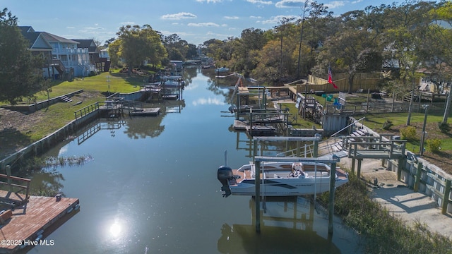 107 SW 25th St, Oak Island, NC 28465 - view of dock with a water view