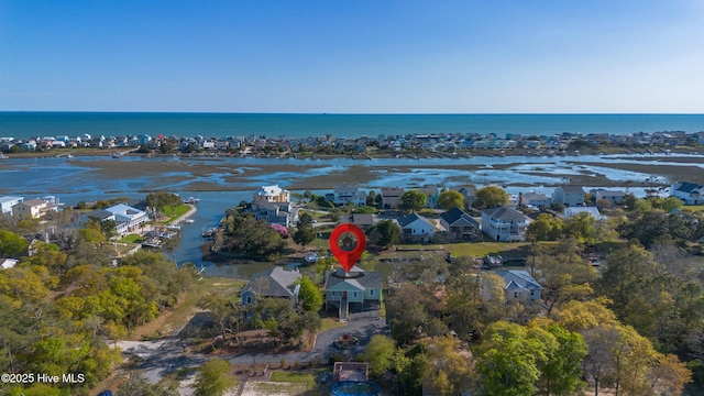 107 SW 25th St, Oak Island, NC 28465 - aerial view with a water view and a residential view