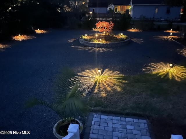 107 SW 25th St, Oak Island, NC 28465 - view of yard at night
